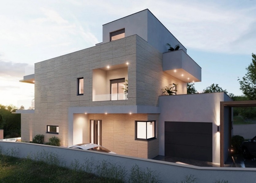 Villa moderne avec garage au crépuscule