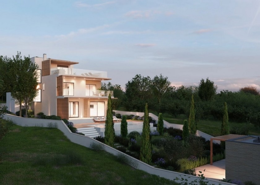 Salon agréable avec cheminée dans une villa moderne en Croatie, vue mer au crépuscule