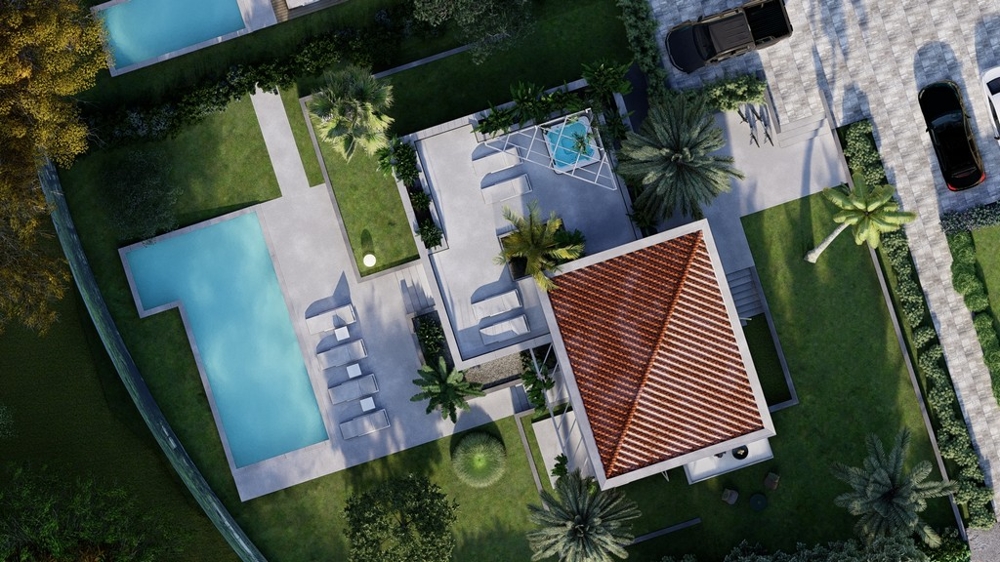 Vue aérienne de la villa avec piscine et jardin