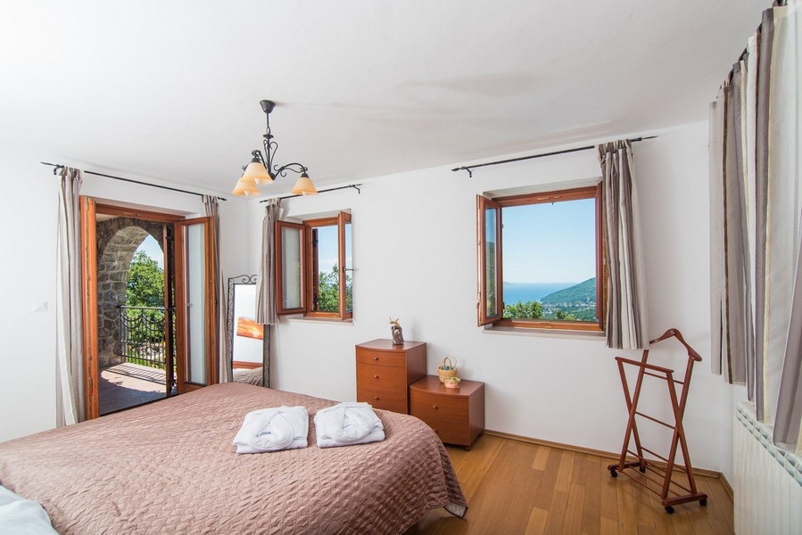 Chambre avec vue mer et accès au balcon