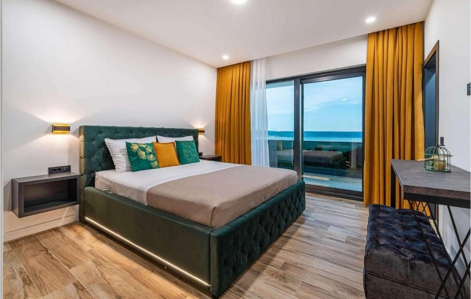 Chambre avec lit double et vue mer