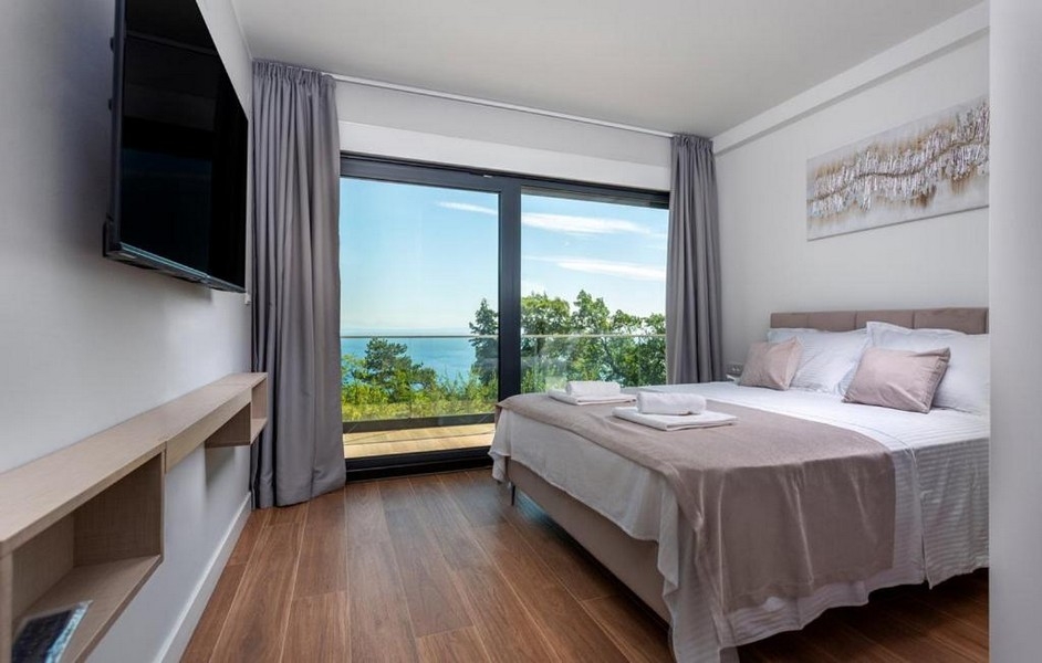 Chambre avec vue mer et accès au balcon