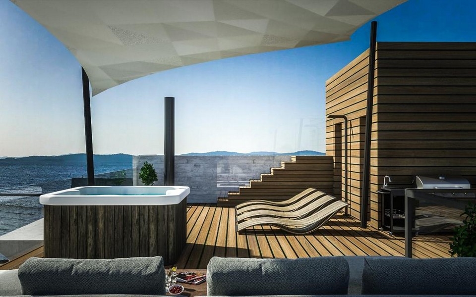Terrasse avec jacuzzi et vue mer