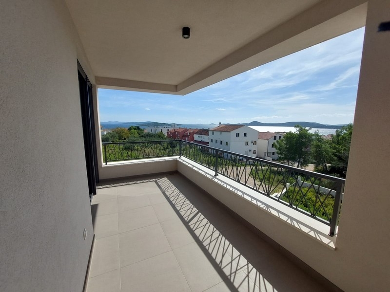 Terrasse couverte avec vue mer