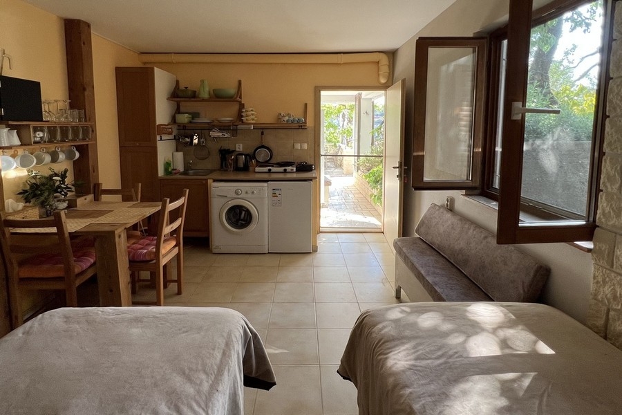 Studio avec kitchenette et accès à l'extérieur