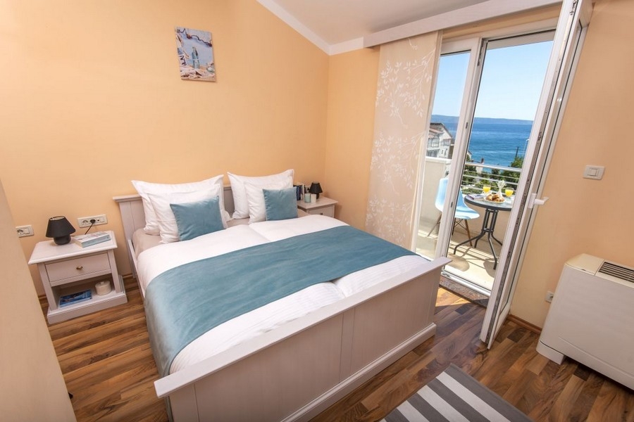 Chambre avec vue mer et accès au balcon
