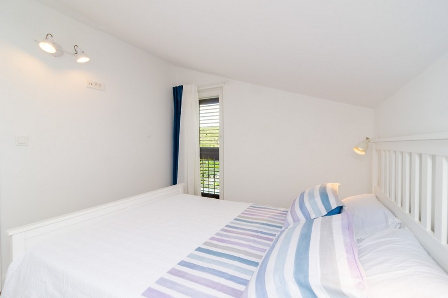 Chambre avec accès au balcon