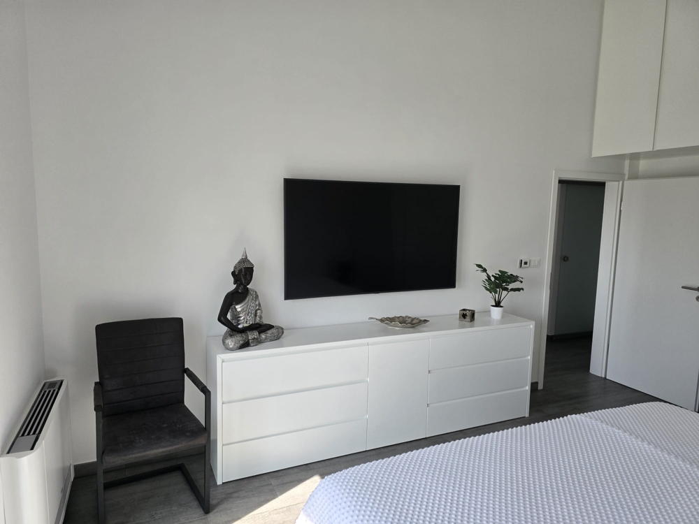 Chambre avec accès au balcon et beaucoup de lumière naturelle