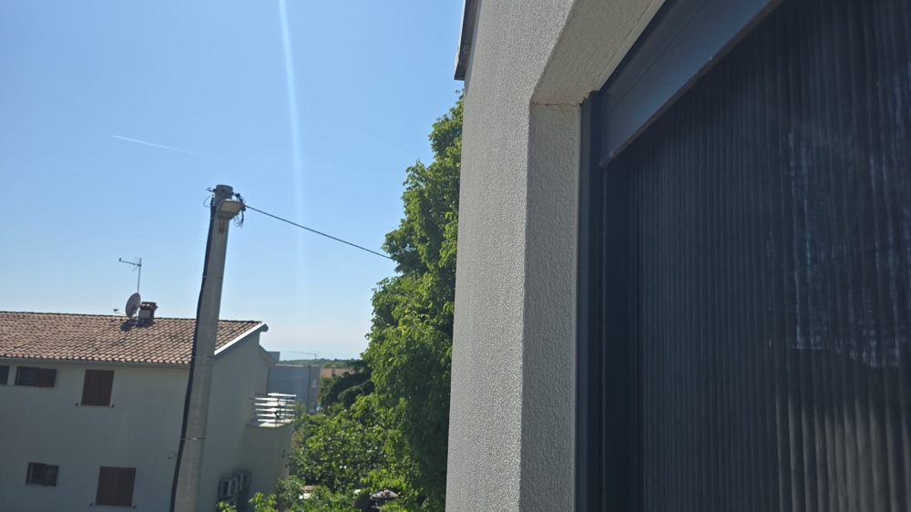 Terrasse avec pergola et vue sur la verdure