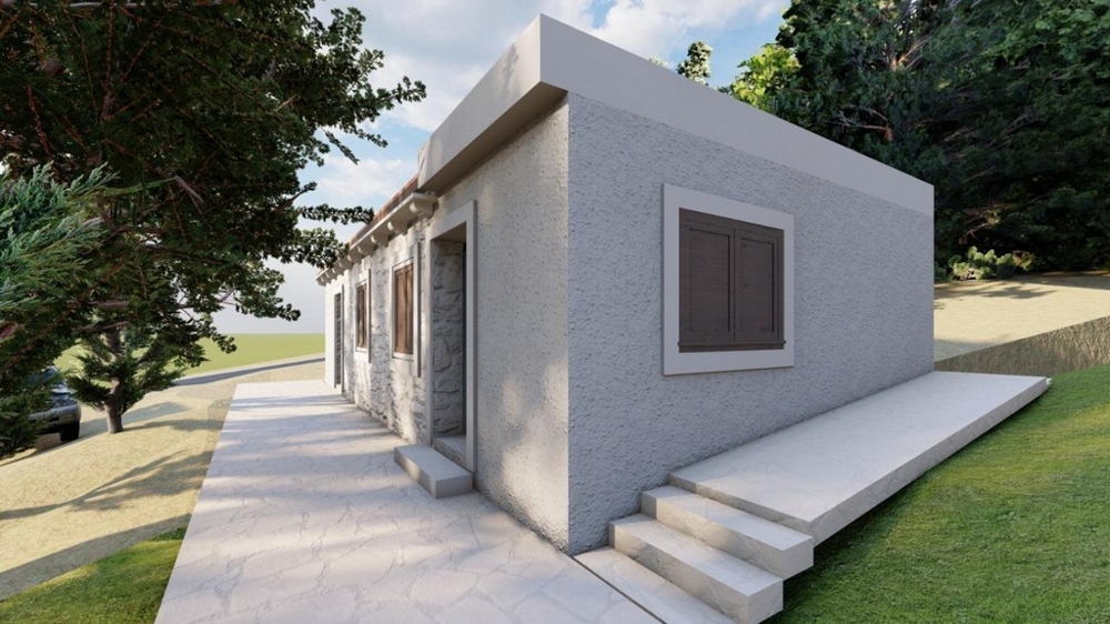 Vue de la maison avec jardin et accès dans un environnement proche de la nature