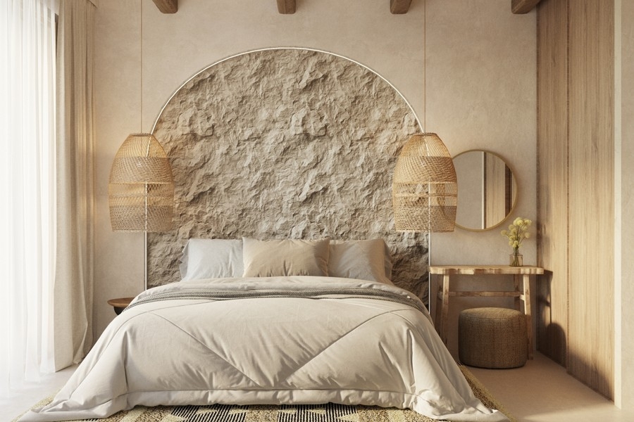 Chambre avec mur en pierre naturelle et ambiance méditerranéenne