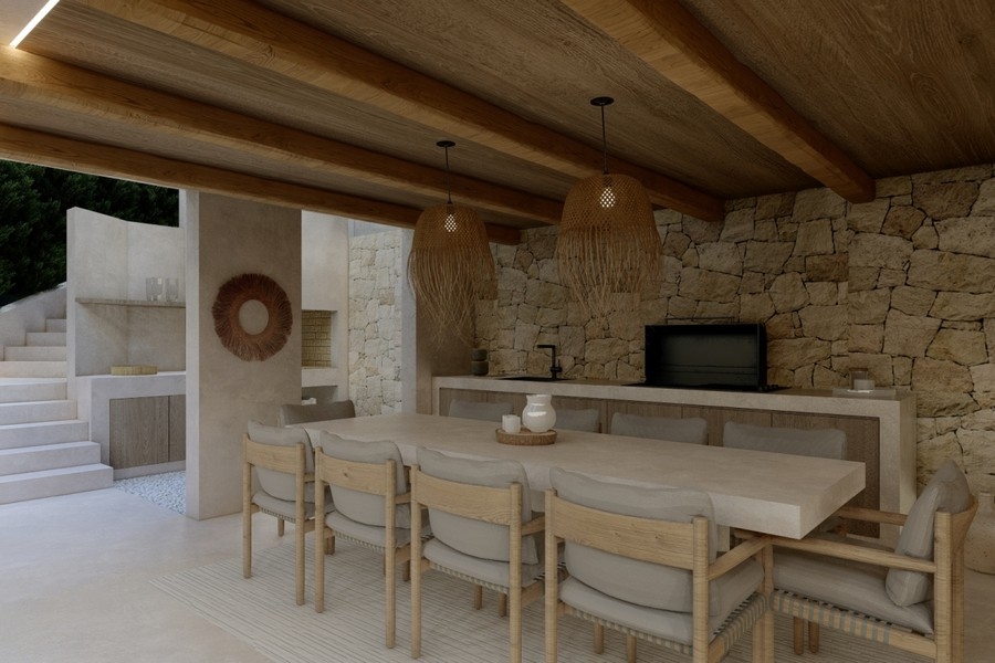 Espace extérieur couvert avec cuisine d'été et coin repas
