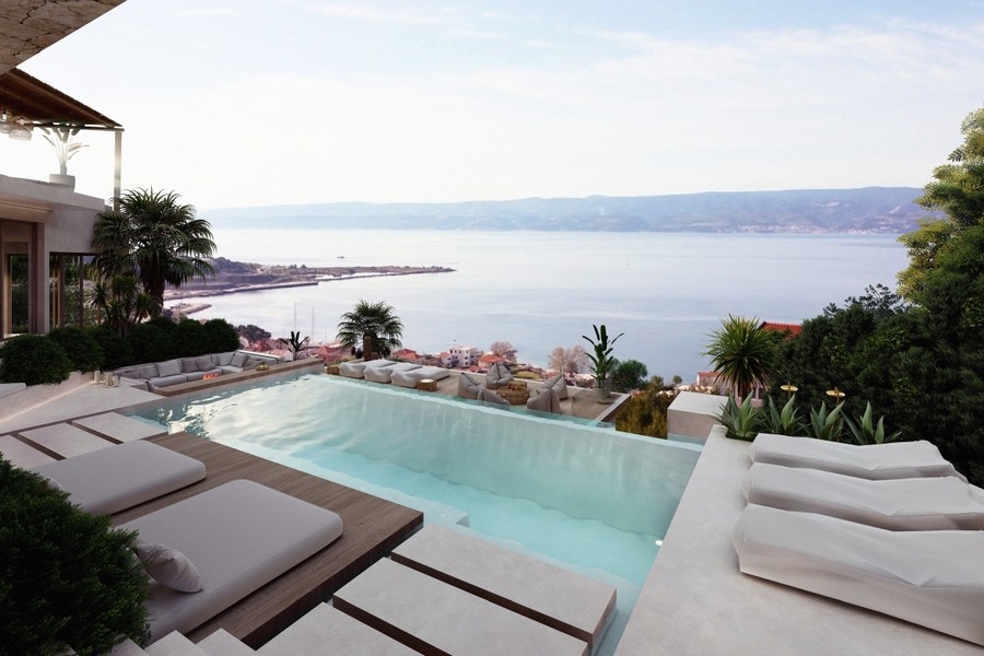 Piscine à débordement avec vue mer devant une villa exclusive en Croatie
