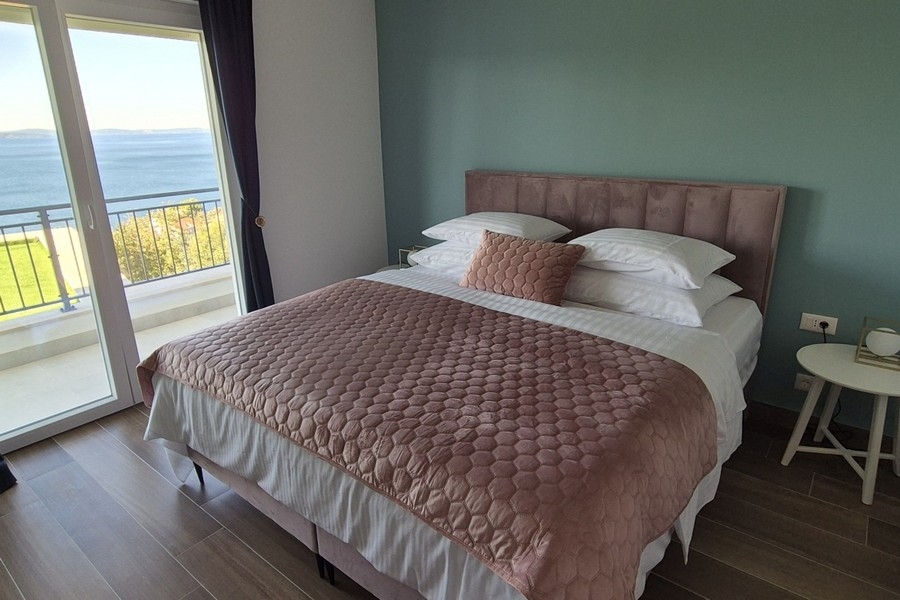 Chambre avec vue mer et accès au balcon
