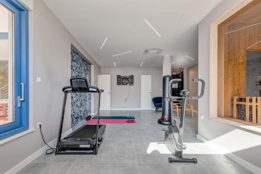 Salle de sport avec sauna