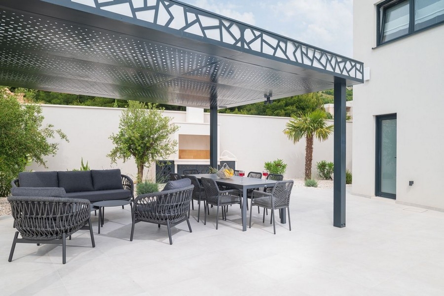 Terrasse lounge avec cuisine d'été