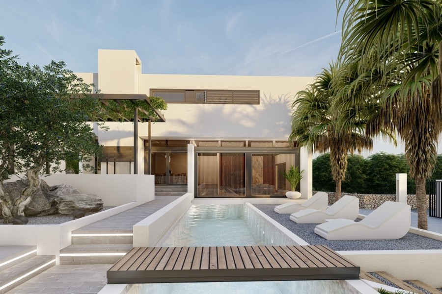Villa avec piscine et grandes baies vitrées donnant sur le jardin
