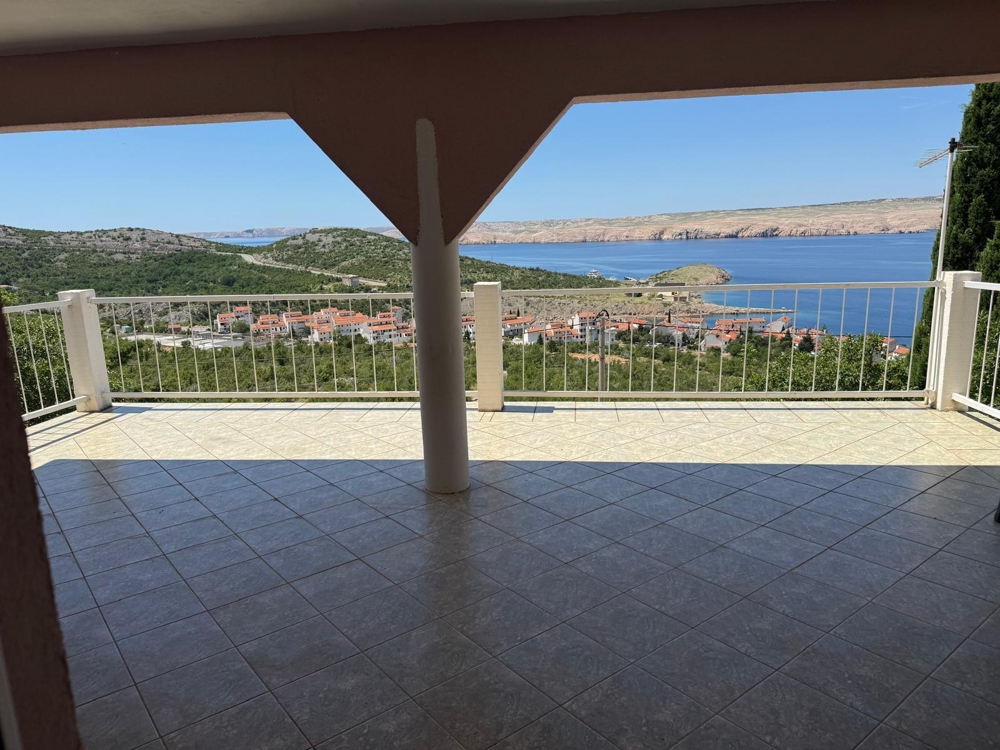 Terrasse couverte avec vue mer