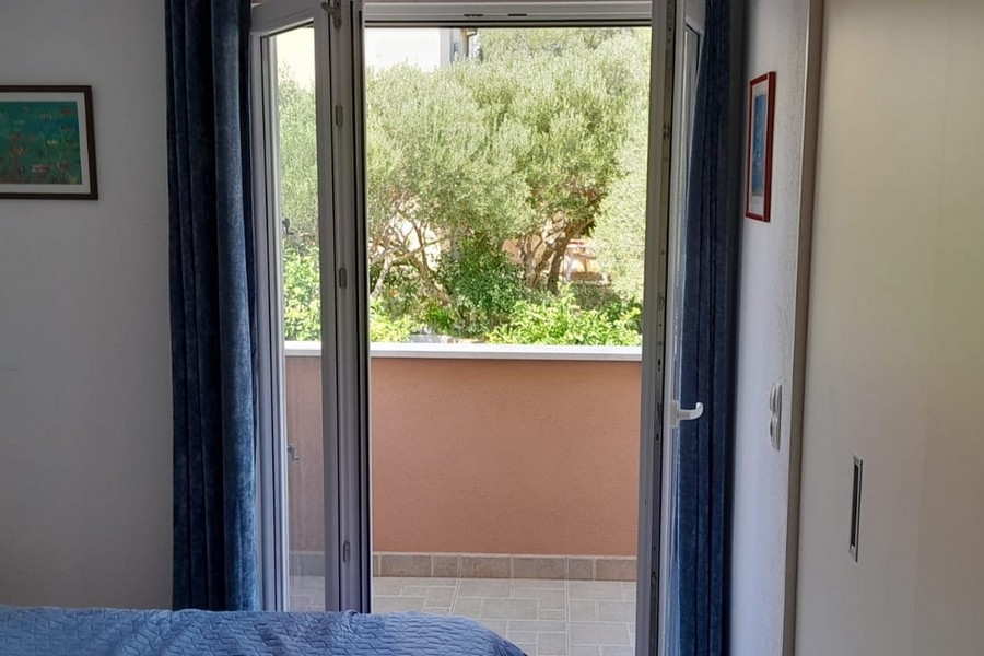 Chambre avec accès au balcon