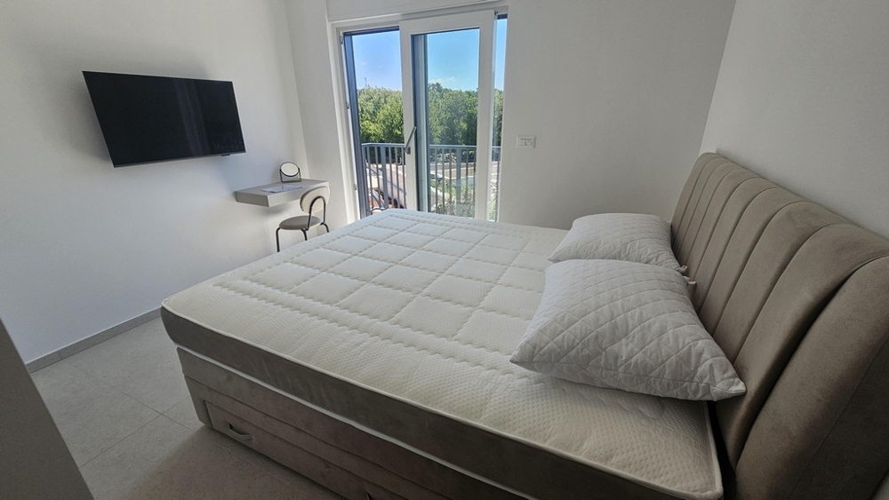 Chambre avec accès au balcon