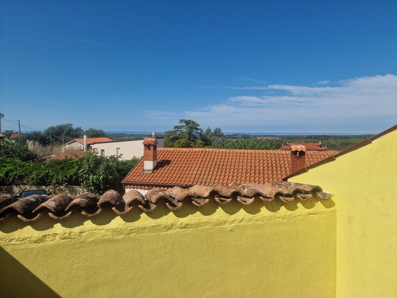 Toit-terrasse avec vue mer à Brtonigla