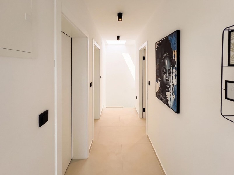 Couloir lumineux desservant les chambres