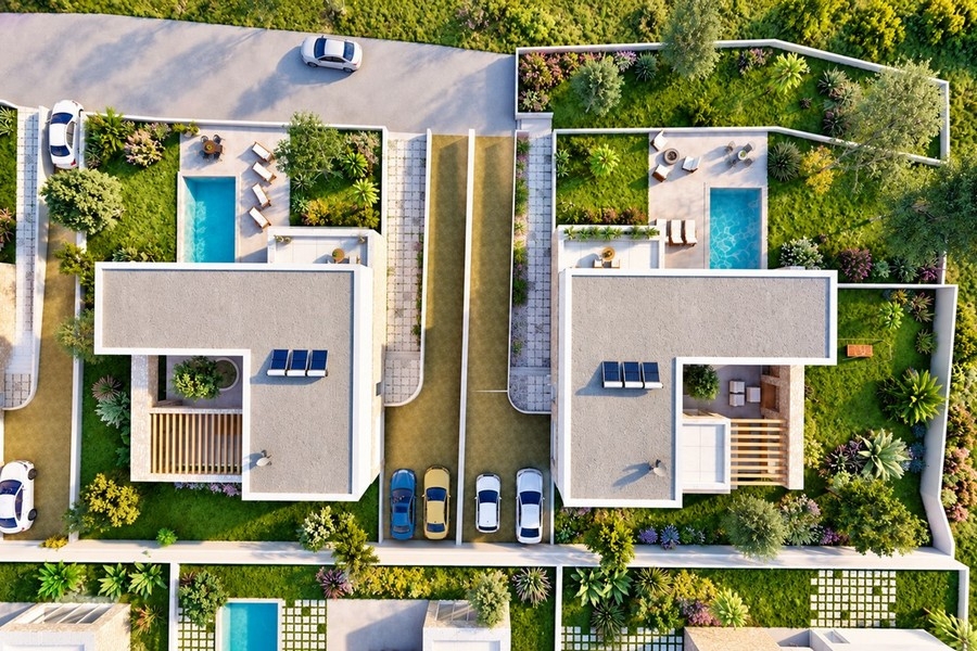 Vue de dessus sur les villas de la résidence avec places de stationnement