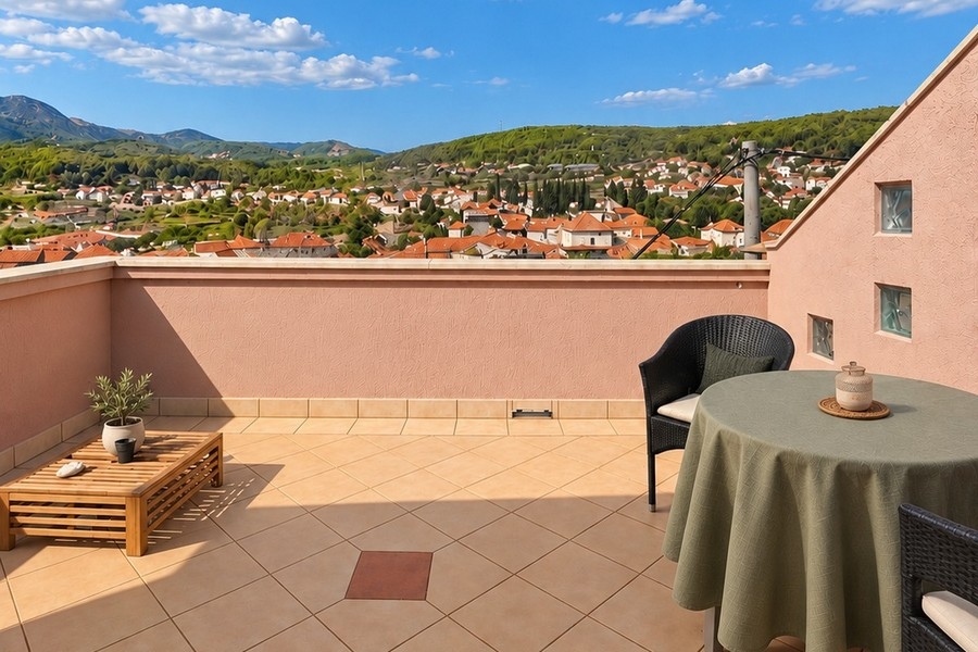 Terrasse avec coin salon et vue sur Jelsa