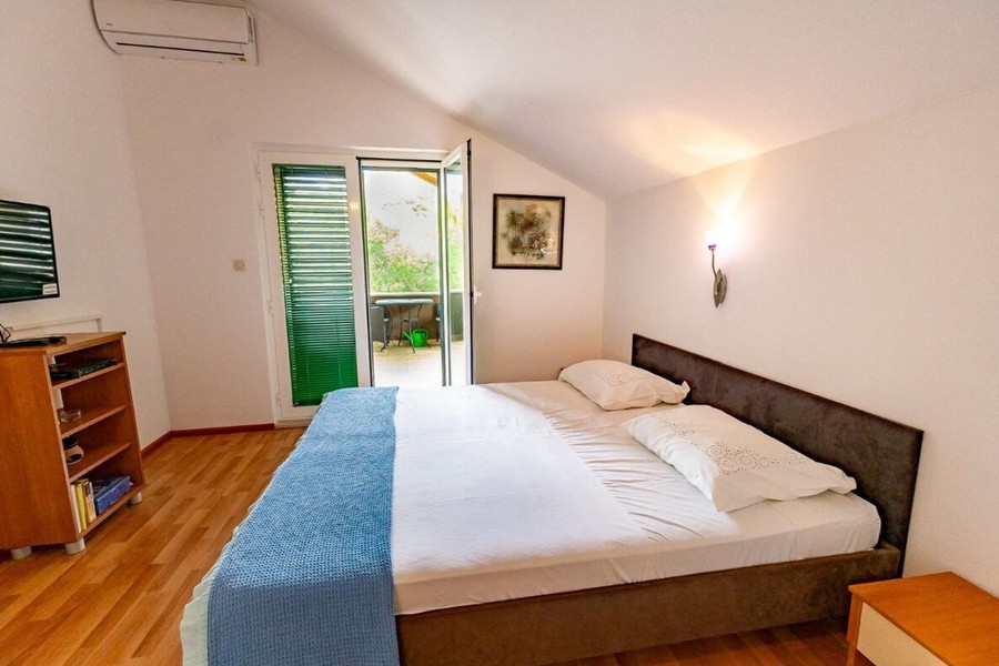 Chambre avec accès à la terrasse