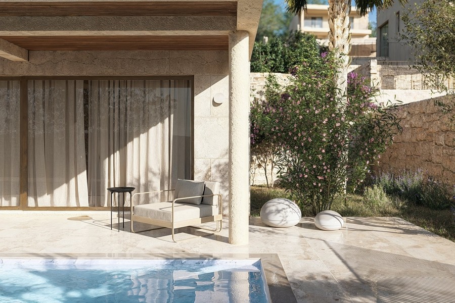 Coin salon sur la terrasse au bord de la piscine