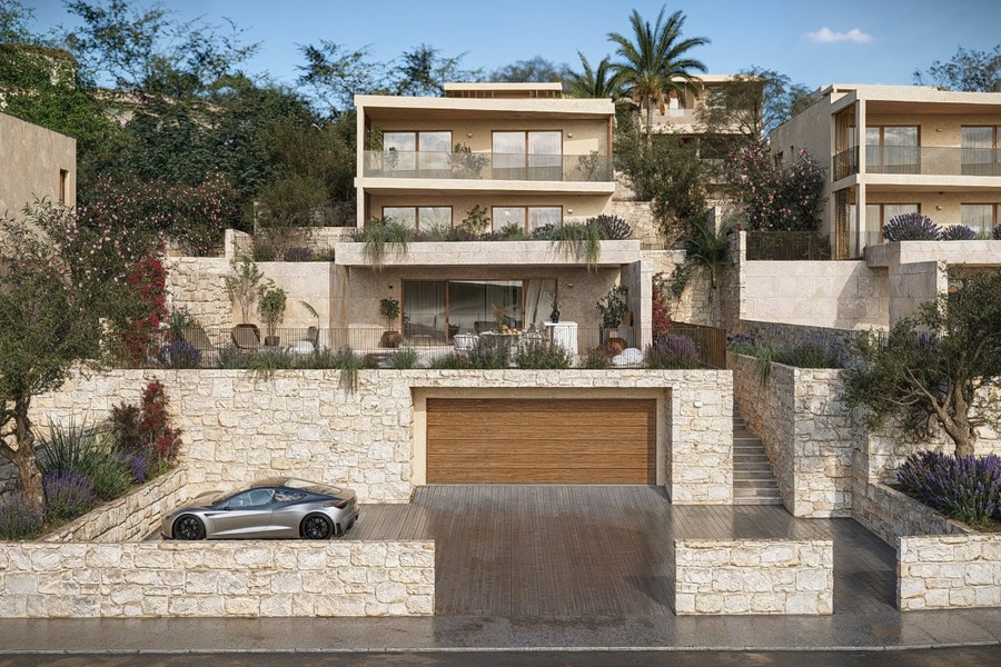 Vue de la villa avec garage et allée d'accès