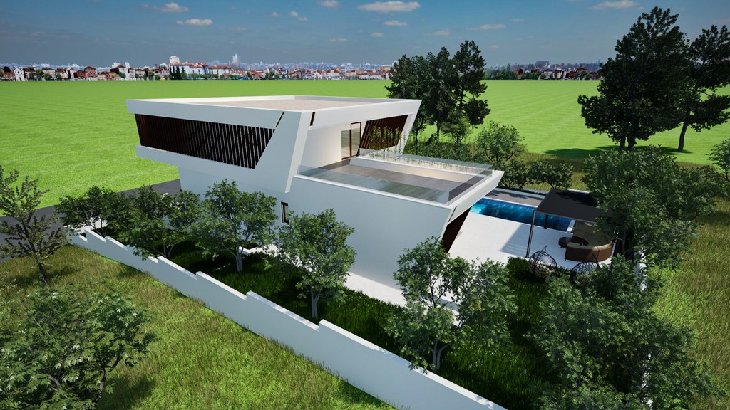 Vue latérale de la villa avec piscine et jardin